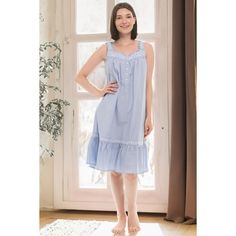 Step into a world of timeless elegance with the Alexander Del Rossa Embroidered Cotton Nightgown. This exquisite piece is a tribute to the romantic allure of vintage fashion, designed to enhance your nighttime wardrobe with its classic charm.

- **Material:** 100% Cotton
- **Color:** Light Blue
- **Size:** Small
- **Gender:** Female
- **Sleeve Type:** Sleeveless
- **Design Features:** Intricate embroidery on bodice and shoulder straps, functional button details, slight V-neckline, ruffled hem wi Feminine Blue Nightgown For Spring, Elegant Night Cotton Dresses, Elegant Cotton Dress For Night, Feminine Blue Sleepwear For Night, Light Blue Lace Trim Nightgown For Home, Feminine Blue Sleepwear, Light Blue Lace Trim Nightgown, Feminine Blue Sleep Dress, Sleeveless Nightgown