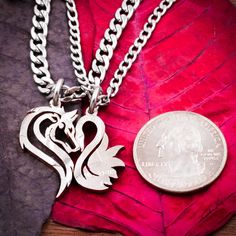 The wolf is snuggling with the swan. These make very powerful and sweet necklaces. We have cut by hand one coin into two necklaces. Check out our other examples of animals making hearts or other relationship sets and message us if you want different animals and we can do that for you. Couples Necklaces, Relationship Jewelry, Necklaces Making, Couples Gifts, Two Necklaces, Sweet Necklace, One Coin, Couple Necklaces, Couple Jewelry