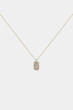 0.13ct white diamond rounds 0.05ct white diamond baguettes adjustable chain 16"-18" 10 x 5.6mm setting 18-karat yellow gold made in usa Suzanne Kalan, Necklace Diamond, Kick Pleat, Jewelry Inspo, Baguette Diamond, Baby Dogs, Dog Tag, Tag Necklace, White Diamond