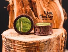 A pair of Wenge ear plugs with green stabilized wood inlay with sizes from 10mm to 50mm or even large upon request. Also, we have FREE shipping for 2 pairs and a 10% discount for 3 any pairsMaterial: Wenge wood + green MaplePrice is for a Pair (2 items)Standard width: 13mm(1/2")Double flared.Every single pair are handmade.100% organic and natural.Parameters can be customized on Your demandAll plugs are covered with natural non-toxic oil to protect the natural beauty and integrity of the wood. Si Elegant Green Plug Earrings For Gift, Adjustable Green Drop Plug Earrings, Handmade Green Drop Plug Earrings, Unique Green Plug Earrings, Stone Plugs Gauges, Ear Gauges Plugs, Stabilized Wood, Belly Piercing Ring, Wenge Wood