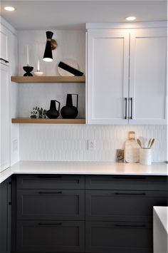 black and white kitchen with open shelving