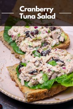 two pieces of bread with tuna salad on it and the words cranberry tuna salad