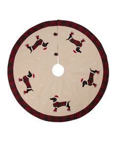 a red and black plaid christmas tree skirt with dachshund dogs on it