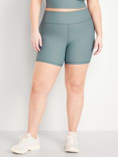 pull-on waistband hidden back pocket go-dry wicks moisture sits at belly button fitted hits above knee 6" regular inseam models are approx.  5'9" and wear sizes s (4), l (12), and xl (18)machine wash according to the care instruction label Hip-length Activewear With Built-in Shorts For Sports, Solid Moisture-wicking Athletic Shorts In Recycled Polyester, Sporty Hip-length Activewear With Built-in Shorts, Solid Recycled Polyester Athletic Shorts For Sports, Solid Color Medium Support Sports Bottoms, Compressive Moisture-wicking Biker Shorts With 5-inch Inseam, High Stretch Activewear For Sports With Short Inseam, Medium Support Go-dry Shorts, Compressive Activewear Shorts With Elastic Waistband