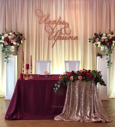 the table is set up with flowers and candles