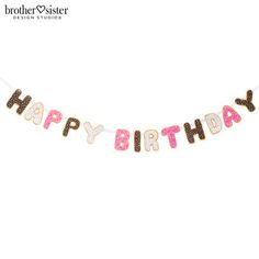 a happy birthday banner with the words happy birthday spelled in pink and gold glitter letters