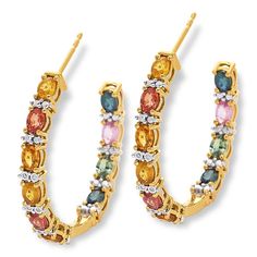 Colleen Lopez Multicolor Sapphire and Diamond Hoop Earrings  These beautiful, inside-outside hoop earrings feature a rainbow of oval-cut sapphires, including sparkling shades of yellow, orange, green and blue. Sprinkled with white diamond accents, these versatile earrings will coordinate with just about anything in your closet!        Approx. 1-1/8"L x 1/8"W     Stamped .925; rhodium plating; yellow gold plating     Pierced with clutch backs     Inside-outside hoop earrings have prong-set, oval Red Sapphire, Color Bands, Orange Sapphire, Green Sapphire, Diamond Hoop Earrings, Yellow Sapphire, Shades Of Yellow, Jewelry Business, Gold Plated Silver