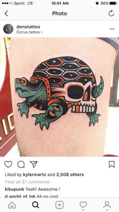 a tattoo with a turtle and skull on it