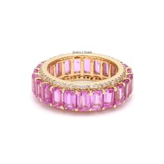 Pink sapphire emerald cut eternity band ring gold | Natural pink sapphire diamond ring gold | Emerald cut sapphire ring | Pink wedding band GEMSTONE DETAILS : ✦ Gemstone : Pink Sapphire ✦ Gemstone Type : Natural ✦ Gemstone Size : 5x3 mm ✦ Gemstone Shape : Emerald cut / Octagon cut ✦ Number of Gemstones : 22 ✦ Gemstone Weight : 7-8 carats ✦ Gemstone Grade : AAA DIAMOND DETAILS : ✦ Diamond Type : Natural ✦ Diamond Size : 1.00 mm ✦ Diamond Color : F-G ✦ Diamond Clarity : Slightly included ✦ Diamond Fine Jewelry Eternity Band With Baguette Cut Gemstone, Baguette Cut Gemstone Eternity Band In Fine Jewelry, Baguette Cut Gemstone Eternity Band, Pink Wedding Band, Emerald Cut Sapphire Ring, Emerald Cut Eternity Band, Pink Sapphire Diamond Ring, Diamond Ring Gold, Rainbow Sapphires