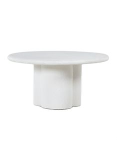 a white table with a round top on a white background