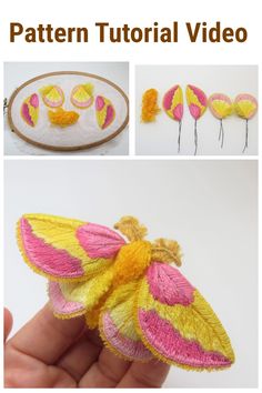 a hand holding a small yellow and pink butterfly