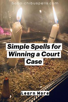 two candles with the words simple spells for winning a court case on top of them