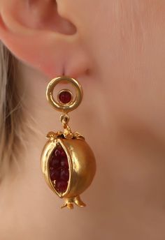 Handmade earrigns made out bronze ,plated by 18K-24K gold,Oxidized to have a unique historical The needle part is made out silver to avoid allergy. Ottoman earring pomegranate is very beautiful, it has a meaning of health and abundance, it is a museum earring. Antique Jeweled Earrings For Gift, Gold Garnet Earrings For Wedding, Traditional Jewel Earrings For Gift, Traditional Jeweled Earrings For Gifting, Traditional Jeweled Earrings As Gift, Traditional Jeweled Earrings For Gifts, Pomegranate Earrings, Pomegranate Design, Wrap Earrings