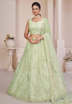 Pista green net lehenga choli for women 87013 Desc: Style : Circular Lehenga Choli Color : Pista Green Fabric : Net Work : Sequence Embroidery Wash Care : Dry clean Sleeve Style : Sleeveless Long Sleeves : Done only in Custom Stitch Sleeves Lining : Done only in Custom Stitch Bust Size : 32 to 42 Inches Occasion : Mehendi Reception Ceremonial Baby Shower Teej Vijayadashami Engagement Party Wear. With Express Free Shipping Buy Lehenga - Indian Party wedding and bridal Pista ... Anarkali Lehenga Gowns, Sequins Lehenga Choli, Sequin Lehenga, Net Lehenga Choli, Bridal Lehenga Online, Anarkali Lehenga, Pista Green, Sequence Embroidery, Green Lehenga