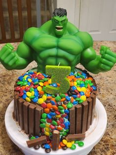 the hulk cake is decorated with candy and candies