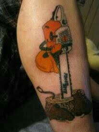 a man with a tattoo on his arm has a chainsaw and an orange helmet