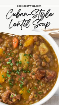 a white bowl filled with stew and vegetables