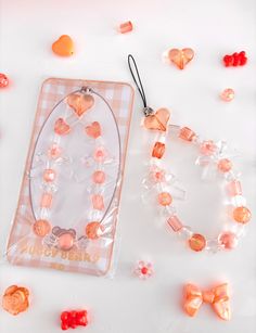 an assortment of candies and candy arranged on a table with a tag that says happy birthday