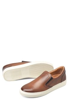 Classic and comfortable, this sneaker topped with softly polished leather features a simple, streamlined upper and a cupsole made of grippy rubber. Removable insole Leather upper and lining/rubber sole Imported Sneaker Men, Tan Brown, Size 13, Slip On Sneaker, Top Sneakers, Rubber Sole, Leather Upper, Slip On, Nordstrom