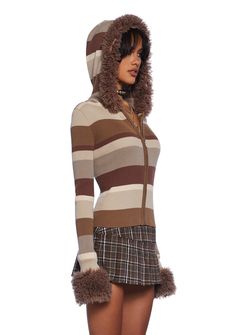 Look chic drinking that java with this cardigan that has a ribbed knit construction, a striped design, a hoodie with a fluffy faux fur trim, long sleeves with a faux fur trim, and a front zipper closure. Striped Long Sleeve Winter Cardigan, Cozy Striped Winter Outerwear, Striped Outerwear With Ribbed Cuffs For Winter, Fitted Cozy Hoodie For Winter, Fitted Brown Hoodie For Winter, Fitted Brown Winter Hoodie, Striped Fitted Cardigan For Winter, Striped Knit Outerwear For Winter, Striped Hooded Outerwear For Fall