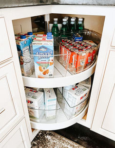 an organized pantry with drinks and snacks in it