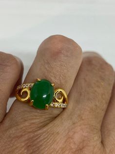 Vintage Lucky Green Nephrite Jade ring Fun jade is color enhanced Large green nephrite jade Ornate German Gold finished Vintage ring, does not tarnish, NOT sterling Size 6.5, 7 or 9 All rings are shipped free in the US in a nice gift box. Check out our over a THOUSAND great reviews Engraving is $4 per letter and is not always perfect depending on the piece. It can take a few days if the jeweler is busy. This is payable to Paypal Judithsltd@gmail.com Green Jade Spiritual Rings, Spiritual Green Jade Rings, Quartz Choker, Pretty Accessories, Lucky Green, Nephrite Jade, Jade Ring, Vintage Ring, Ring Vintage