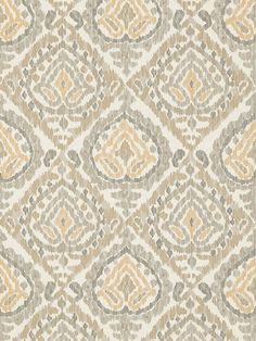 a beige and grey fabric with an intricate design