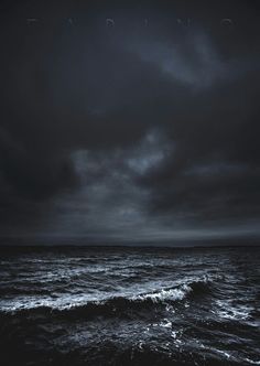 the ocean is dark and stormy at night