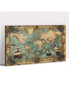 an old world map with ships and compasss on the front, mounted on a white wall