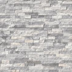 a white brick wall that is made out of grey and white marble bricks, with no mortars or mortars on it