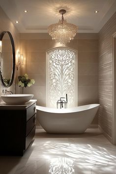 a bathroom with two sinks and a bathtub next to a large mirror on the wall