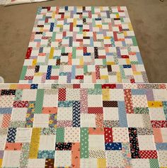 a patchwork quilt is laying on the ground with it's backings laid out