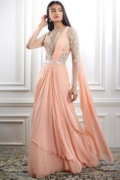 Shop for Mandira Wirk Peach Viscose Georgette Embroidered Pre-draped Saree Gown for Women Online at Aza Fashions Draped Saree Gown, Indo Western Saree, Saree Gowns, Drape Sarees, Pleated Saree, Peach Saree, Gown Party Wear, Full Sleeve Blouse, Saree Gown