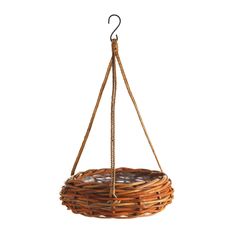 a basket hanging from a hook on a white background