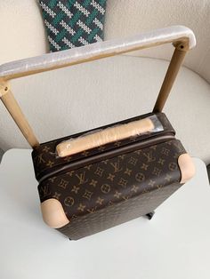 Travel with Timeless Elegance: Horizon 55-Inspired Suitcase in Monogram Canvas Embark on your journeys with this Horizon 55-inspired suitcase, a tribute to Louis Vuitton's legacy of craftsmanship and innovation. The iconic monogram canvas, rendered in a timeless brown colorway, exudes sophistication and prestige. Designed for effortless travel, this suitcase boasts smooth-rolling wheels and a lightweight construction. The spacious interior offers ample room for your belongings, while the distinc Designer Rectangular Travel Case, Luxury Travel Cases, Luxury Rectangular Case For Business Trips, Luxury Rectangular Cases For Business Trips, Designer Travel Cases With Luggage Sleeve, Luxury Travel Cases With Luggage Sleeve, Luxury Cases With Luggage Sleeve For Trips, Designer Luggage For Trips, Luxury Luggage With Sleeve For Business Trips