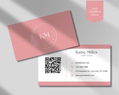 a pink business card with a monogrammed circle on the front and back side