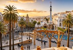 the sun is setting over a city with palm trees