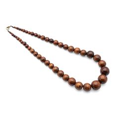 PRICES MAY VARY. MADE THE NATURAL WAY: Using traditional handmade methods with ethically sourced Brazilian walnut wood COMPLETE YOUR LOOK: Whether casual, formal, these versatile wood bead necklaces add a final touch to any occasion SUPPORT AN ETHICAL TRADE PROGRAM: Supports Brazilian artisans and their communities, not manufacturers selling mass-produced wooden beads AVAILABLE IN MULTIPLE OPTIONS: Choose from a choice of natural wood, black, or other finishes GREAT GIFT: Give the Nanalou wooden Long Neckless, Wooden Bead Necklaces, Chunky Bead Necklaces, Wood Bead Necklace, Bead Necklaces, Final Touch, Necklace Black, Beads Necklace, Strand Necklace