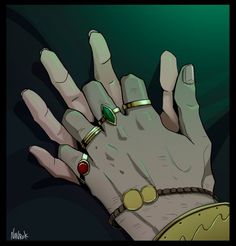 a person's hand with three rings on it and two different colored stones in the middle