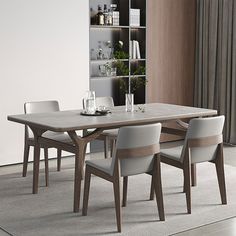 a dining room table with chairs and a bookcase in the back ground, next to a bookshelf