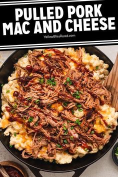 pulled pork mac and cheese in a cast iron skillet with text overlay that reads pulled pork mac and cheese