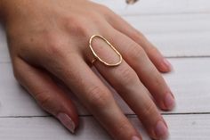 14K Gold Large Oval Karma Ring is now available. Both the oval and band have been hammered by hand for added sparkle and shine. The Oval Karma Ring is meant to attract good karma to you and those around you as well as remind you that what comes around goes around. Now available in 14K Yellow Gold, 14K Rose Gold and 14K White Gold. Love this? Check out our Bestseller 14K Gold Circle Karma Ring here: https://www.etsy.com/WhiteSandJewelry/listing/779795015/solid-gold-karma-ring-14k U.S. ring sizes Hammered Oval Wedding Rings, Oval Hammered Wedding Rings, Modern Oval Hammered Jewelry, Handmade Modern Oval Rings, Modern Hammered Oval Jewelry, Modern Handmade Oval Rings, Oval Hammered Jewelry For Wedding, Oval Hammered Wedding Jewelry, Karma Ring