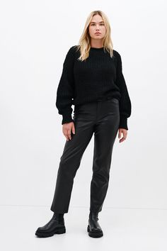 Meet your new favorite classic, the Audrey Sweater. Knit from our devastatingly soft French Merino wool-blend yarn and featuring a looser weave with just the right amount of chunky. Audrey has a roomy fit, dropped shoulders, and long, beautiful balloon sleeves finished with a thick ribbed cuff. | Sydney, in black, is 5'11" (180 cm) tall, wearing size L. Yada, in black, is 5'9" (175 cm) tall, wearing size XS. Approximately 25.5" (65 cm), measured from the shoulder to the bottom hem. Approximately 24" (61 cm) in sleeve length. French Merino Wool Blend (20% Merino Wool, 80% Acrylic). Very soft and appropriate for sensitive skin. Dry clean or hand wash in cold water and lay flat to dry. Designed in NYC. Handcrafted in Europe. | Marcella Audrey Long Sleeve Sweater in Dark Gray | Women's Size XS Audrey Sweater, Loose Knit Sweaters, Sweatshirt Fabric, Grey Women, Sweater Knit, Balloon Sleeves, Red Sweaters, Sleeve Sweater, French Terry