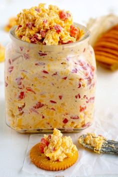 a jar filled with food sitting on top of a table