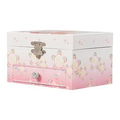 a pink and white box with flowers on it