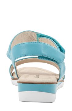 A lightweight sole and plush cushioning means smooth strides in this vacay-ready sandal made from premium leather. 1" heel Adjustable slingback strap with hook-and-loop closure Cushioned footbed Leather upper and lining/synthetic sole Imported Vacation Sandals With Adjustable Straps And Slingback, Comfortable Adjustable Slingback Sandals With Buckle, Summer Slingback Sandals With Ortholite Insole, Casual Slingback Footbed Sandals With Heel Strap, Synthetic Open Toe Slingback Sandals With Adjustable Straps, Vacation Slingback Sandals With Arch Support, Cushioned Slingback Sandals For Vacation, Comfortable Slingback Sandals With Ankle Strap And Arch Support, Comfortable Slingback Sandals With Arch Support And Ankle Strap