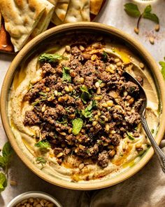 One of the most memorable dishes I ate in 2024 was a creamy hummus from @12chairscafe in NYC. It’s topped with a savory ground lamb mixture with mushrooms, pine nuts, and lots of fresh herbs. I literally wanted to lick the bowl clean, but my fear of judgment got the best of me…

After constantly daydreaming about each bite, I decided to try and recreate it at home. If you live in or around NYC, perhaps just go to their restaurant 😂, but for everyone else… you’ve absolutely *got* to try this! ...