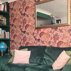 A picture showing pink and floral wallpaper with a large gold framed mirror on the wall and shows a green sofa and the edge of some green shelves Fantastic Wallpapers, Paloma Faith, Home Wallpaper, Front Room, Paloma