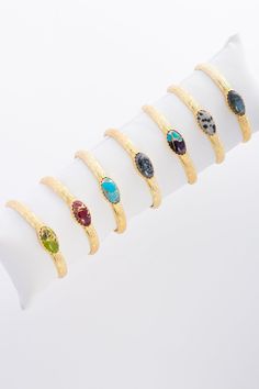 Add a touch of elegance to your outfit with our Gemstone Cuff Bracelet! This bracelet is made of 18k gold-plated brass and showcases a genuine gemstone in the center. We hand-select each stone for its unique beauty, and you can choose from various gemstones, such as turquoise and black onyx, to find the one that speaks to you. The adjustable design ensures a comfortable and secure fit for any wrist, making it a lovely gift for yourself or a loved one. This timeless bracelet is ideal for adding g Timeless Bracelet, Gemstone Cuff Bracelet, Turquoise And Black, Unique Beauty, Light Turquoise, Gold Polish, Green Turquoise, Seasonal Fashion, Gemstone Bracelet