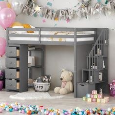 a child's bedroom with a loft bed, desk and toys on the floor